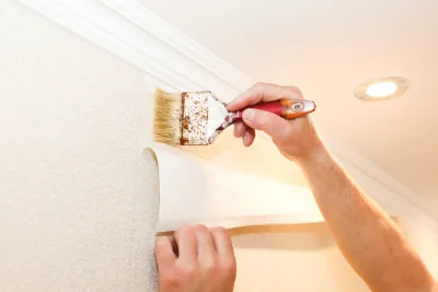 Pose de papier peint à Broxeele — revêtements muraux et toiles de verre
